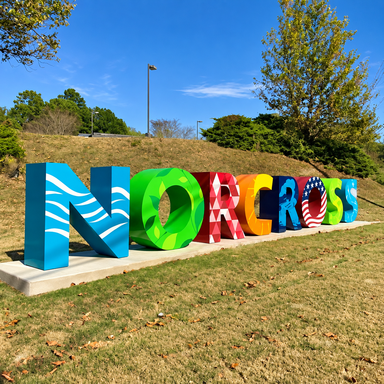 Colorful Norcross landmark sign showcasing a local attraction near Hotels Near Norcross GA Attractions with a scenic outdoor setting